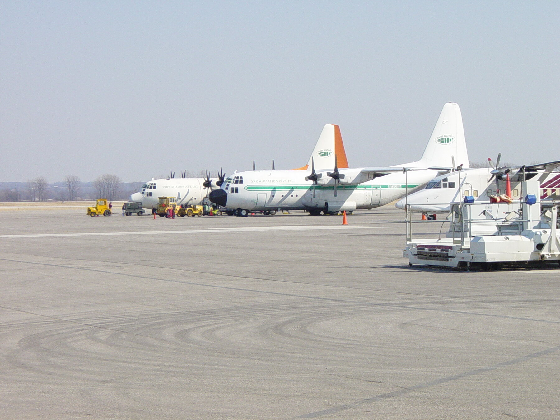 Multiple SAI-modernized C-130 aircraft on the flight line