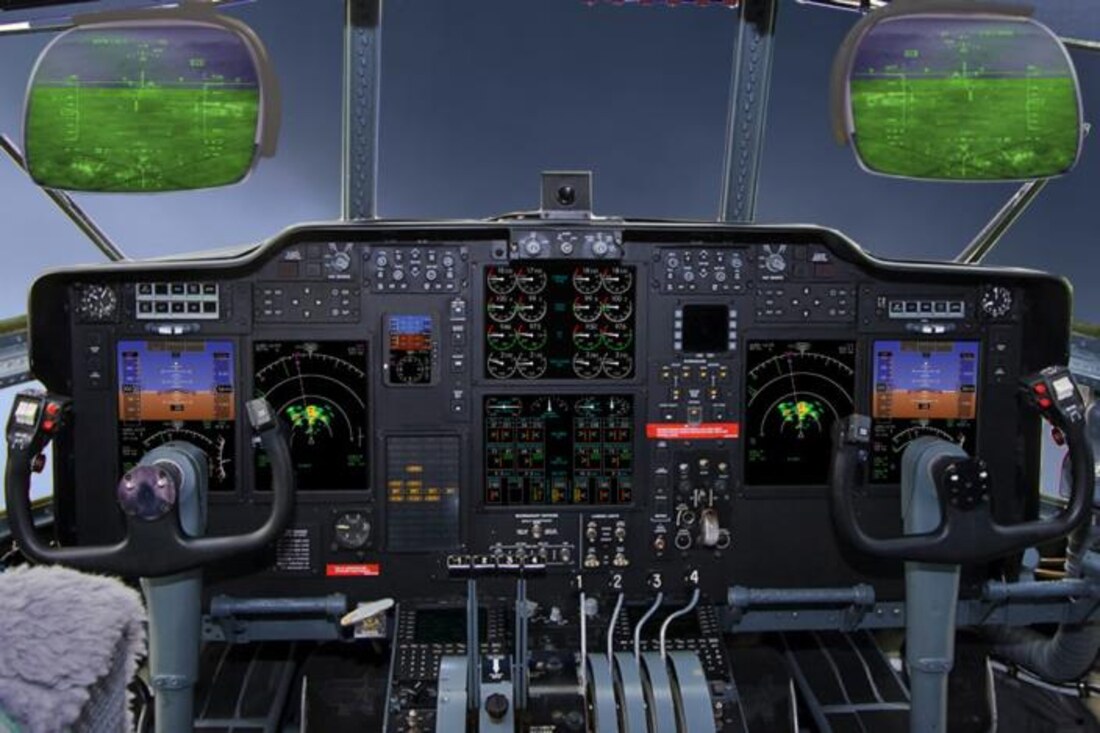 A modern C-130 glass cockpit with multifunction displays after SAI modernization